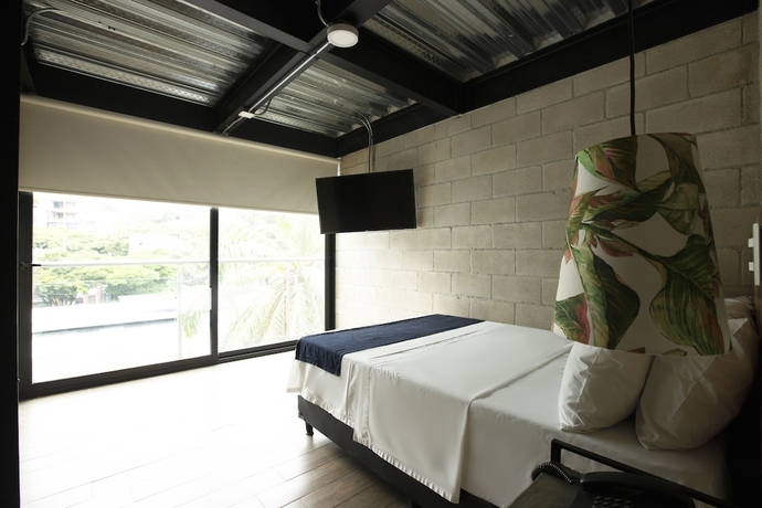Imagen de la habitación del Hotel Lleras Park Concept. Foto 12