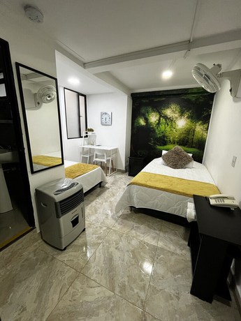 Imagen de la habitación del Hotel Lleras Premium. Foto 4