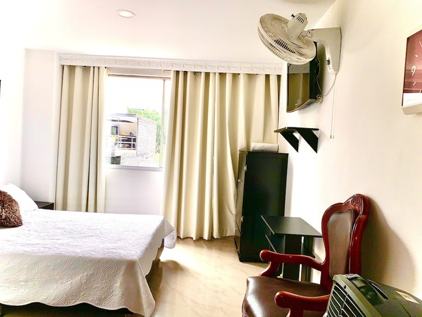 Imagen de la habitación del Hotel Lleras Premium. Foto 6