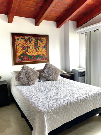 Imagen de la habitación del Hotel Lleras Premium. Foto 8