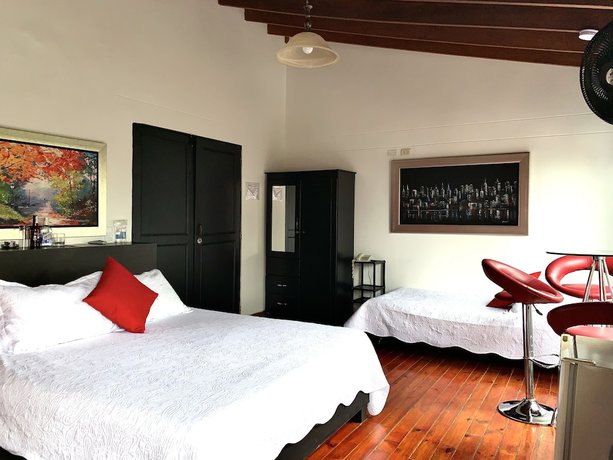 Imagen de la habitación del Hotel Lleras Premium. Foto 9