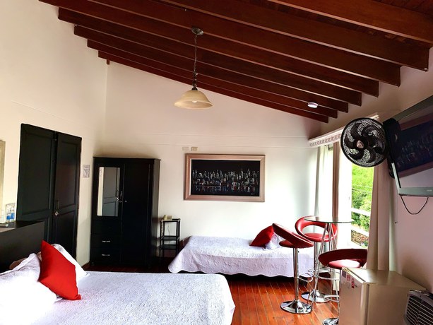 Imagen de la habitación del Hotel Lleras Premium. Foto 11