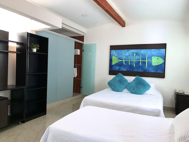 Imagen de la habitación del Hotel Lleras Premium. Foto 12