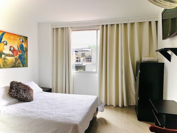 Imagen de la habitación del Hotel Lleras Premium. Foto 13