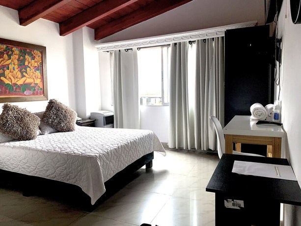 Imagen de la habitación del Hotel Lleras Premium. Foto 14