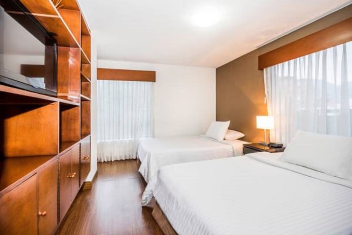 Imagen de la habitación del Hotel Lloyd's Apartasuites Parque 93. Foto 4