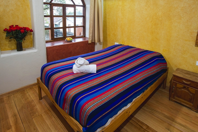 Imagen de la habitación del Hotel Llullu Llama Mountain Lodge. Foto 8