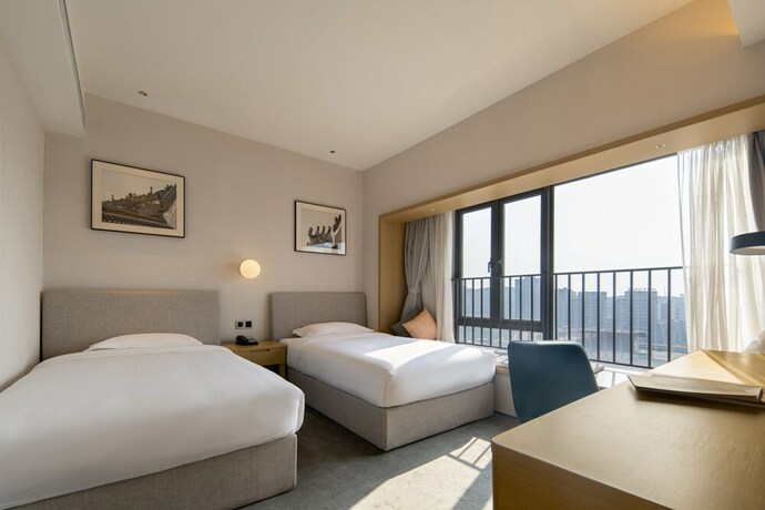 Imagen de la habitación del Hotel Ln Residence Science City Guangzhou. Foto 15