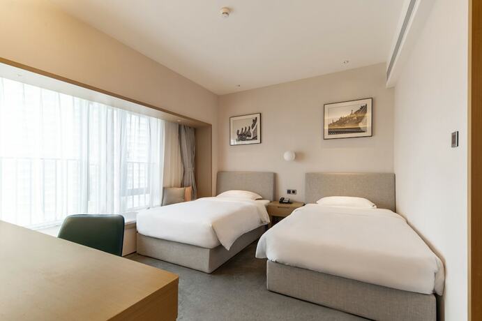 Imagen de la habitación del Hotel Ln Residence Science City Guangzhou. Foto 17