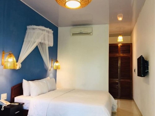 Imagen de la habitación del Hotel Lăng Cô Beach Resort. Foto 4