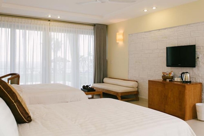 Imagen de la habitación del Hotel Lăng Cô Beach Resort. Foto 11