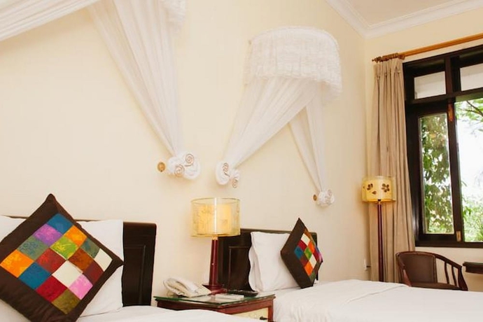Imagen de la habitación del Hotel Lăng Cô Beach Resort. Foto 12