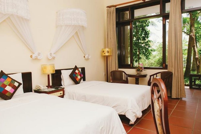 Imagen de la habitación del Hotel Lăng Cô Beach Resort. Foto 13