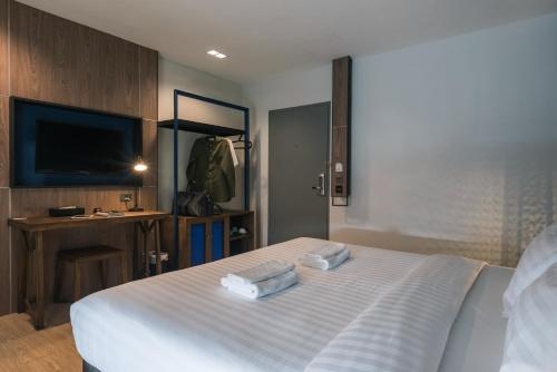 Imagen de la habitación del Hotel Lnimman Chiangmai Boutique. Foto 8