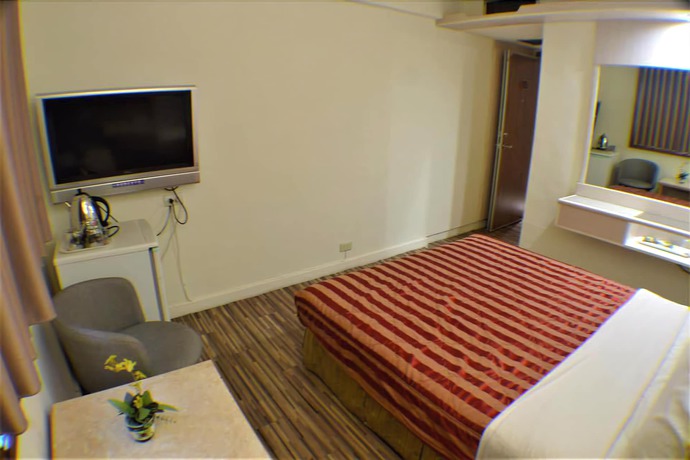 Imagen de la habitación del Hotel Lo Fo Hotel. Foto 7