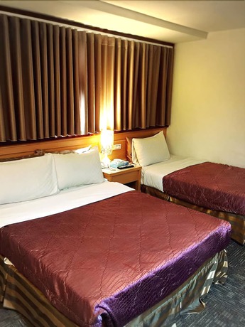 Imagen de la habitación del Hotel Lo Fo Hotel. Foto 8