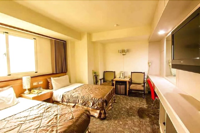 Imagen de la habitación del Hotel Lo Fo Hotel. Foto 13