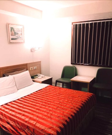 Imagen de la habitación del Hotel Lo Fo Hotel. Foto 15