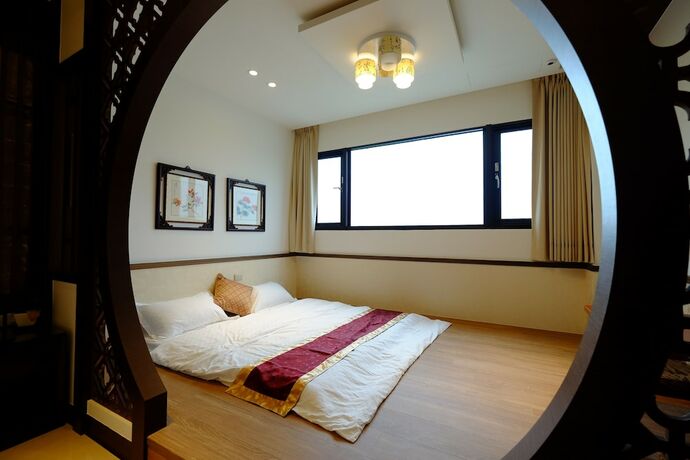 Imagen de la habitación del Hotel Lo Hong Ka Countryside House. Foto 23