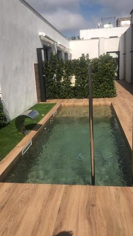 Imagen de la piscina del Hotel Lo Hotel Del Poblet. Foto 7