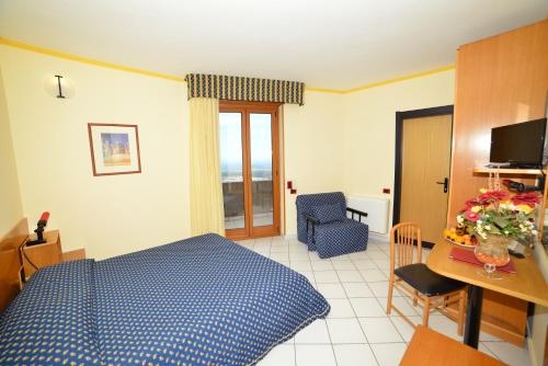 Imagen de la habitación del Hotel Lo Smeraldo, Cisternino. Foto 8