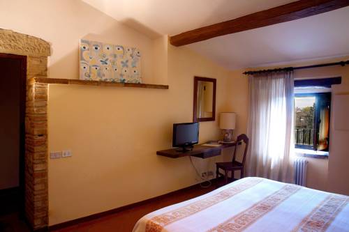 Imagen de la habitación del Hotel Lo Spedalicchio. Foto 15