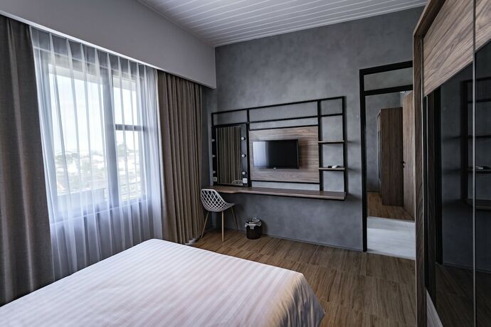 Imagen de la habitación del Hotel Loa Living Solo Baru. Foto 16