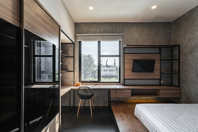 Imagen de la habitación del Hotel Loa Living Solo Baru. Foto 17