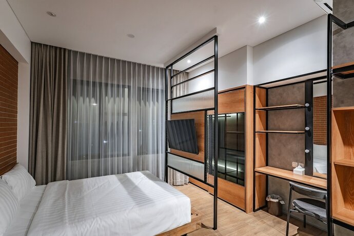 Imagen de la habitación del Hotel Loa Living Solo Baru. Foto 19