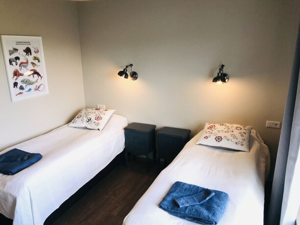 Imagen de la habitación del Hotel Loa´s Nest Guesthouse. Foto 16