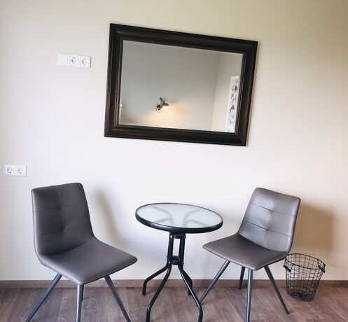 Imagen de la habitación del Hotel Loa´s Nest Guesthouse. Foto 18