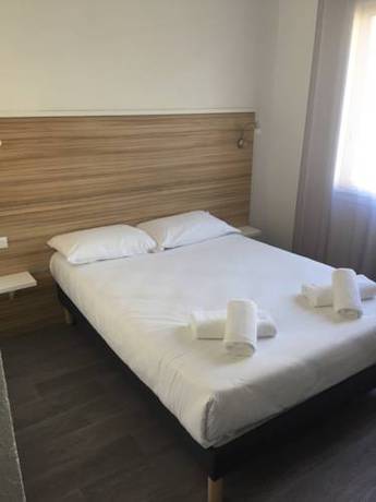 Imagen de la habitación del Hotel L'oasis. Foto 3