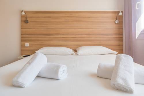 Imagen de la habitación del Hotel L'oasis. Foto 6