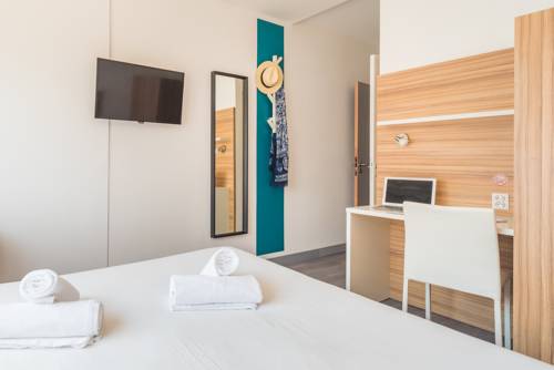 Imagen de la habitación del Hotel L'oasis. Foto 7