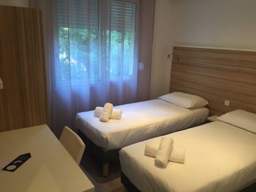 Imagen de la habitación del Hotel L'oasis. Foto 9