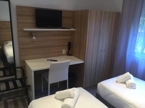 Imagen de la habitación del Hotel L'oasis. Foto 10