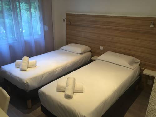 Imagen de la habitación del Hotel L'oasis. Foto 11