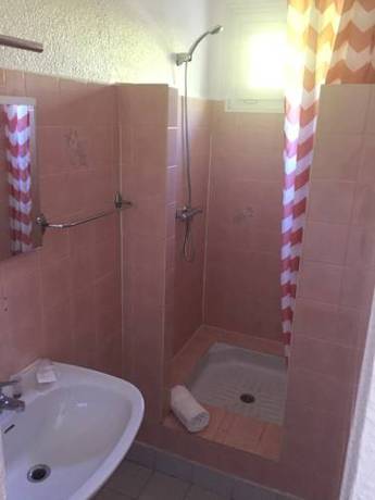 Imagen de la habitación del Hotel L'oasis. Foto 13