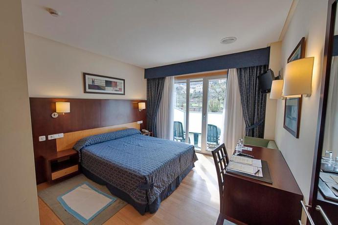 Imagen de la habitación del Hotel Lobios Caldaria Balneario. Foto 4