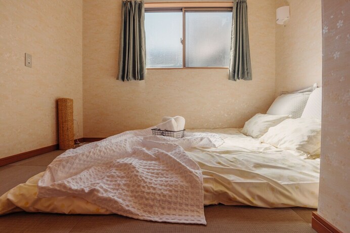 Imagen de la habitación del Hotel Local Stay In Taishi. Foto 32