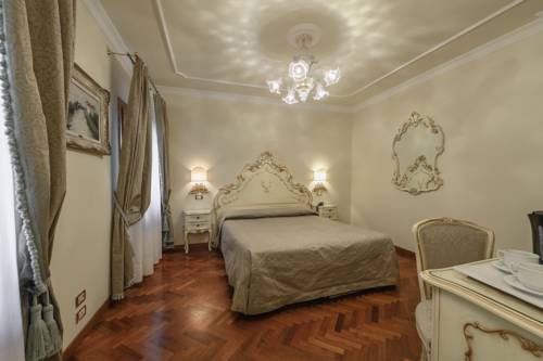 Imagen de la habitación del Hotel Locanda Al Leon. Foto 8