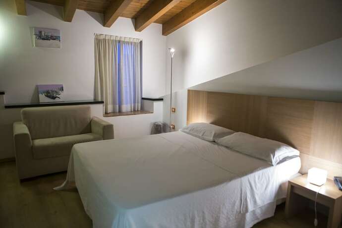 Imagen de la habitación del Hotel Locanda Al Moro. Foto 16