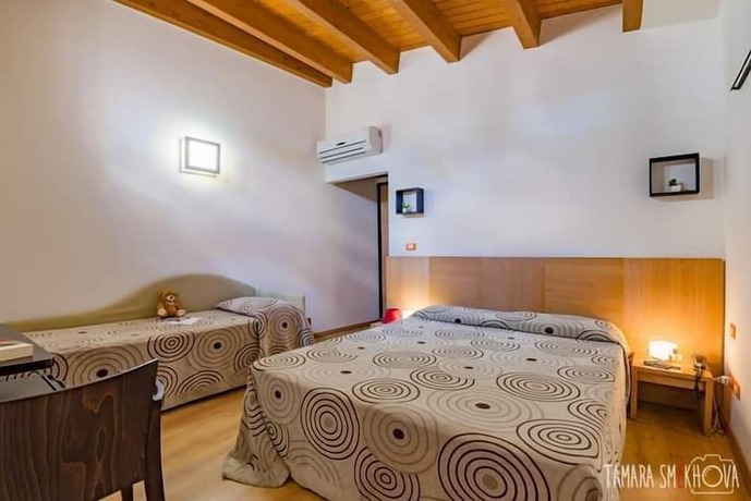 Imagen de la habitación del Hotel Locanda Al Moro. Foto 19