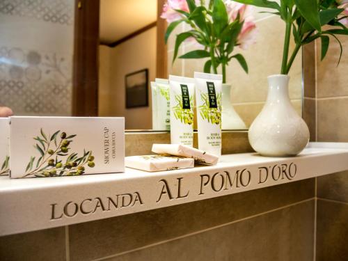 Imagen de la habitación del Hotel Locanda Al Pomo d\'Oro. Foto 5