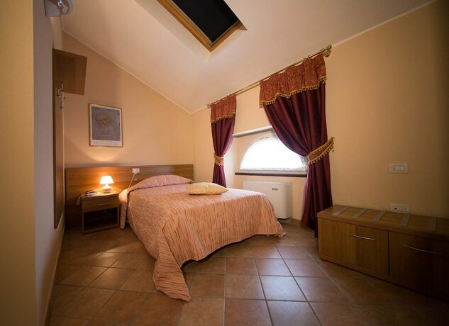 Imagen de la habitación del Hotel Locanda Ca\' Rossa. Foto 18