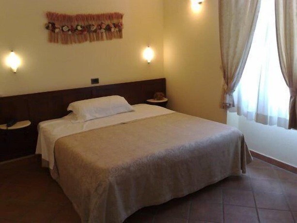 Imagen de la habitación del Hotel Locanda Il Gallo. Foto 11