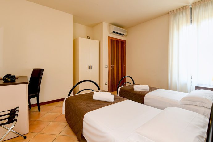 Imagen de la habitación del Hotel Locanda Primavera. Foto 6