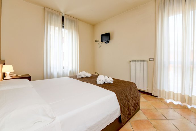 Imagen de la habitación del Hotel Locanda Primavera. Foto 11