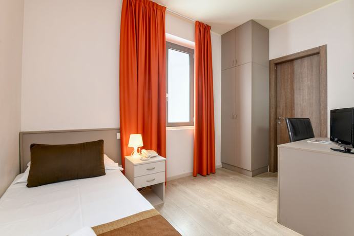 Imagen de la habitación del Hotel Locanda Primavera. Foto 15