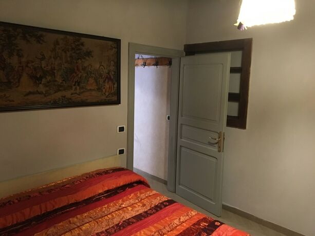 Imagen de la habitación del Hotel Locanda Zita. Foto 16